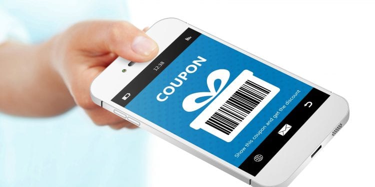 hand holding mobile phone with spring discount coupon isolated over white