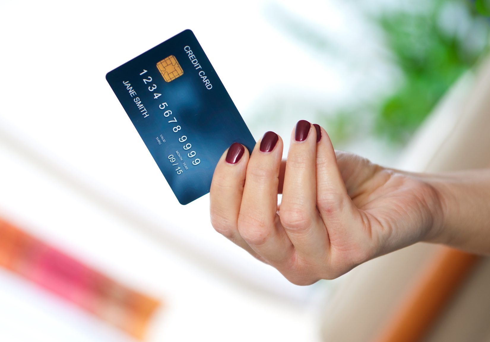 woman hand holding credit card